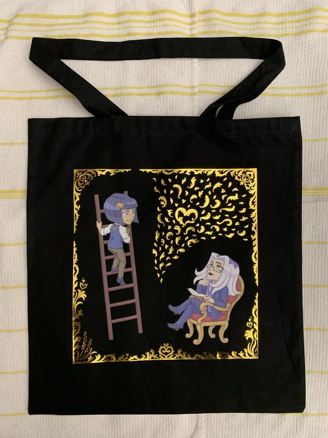 LibraryAU black bag with gold foil vinyl